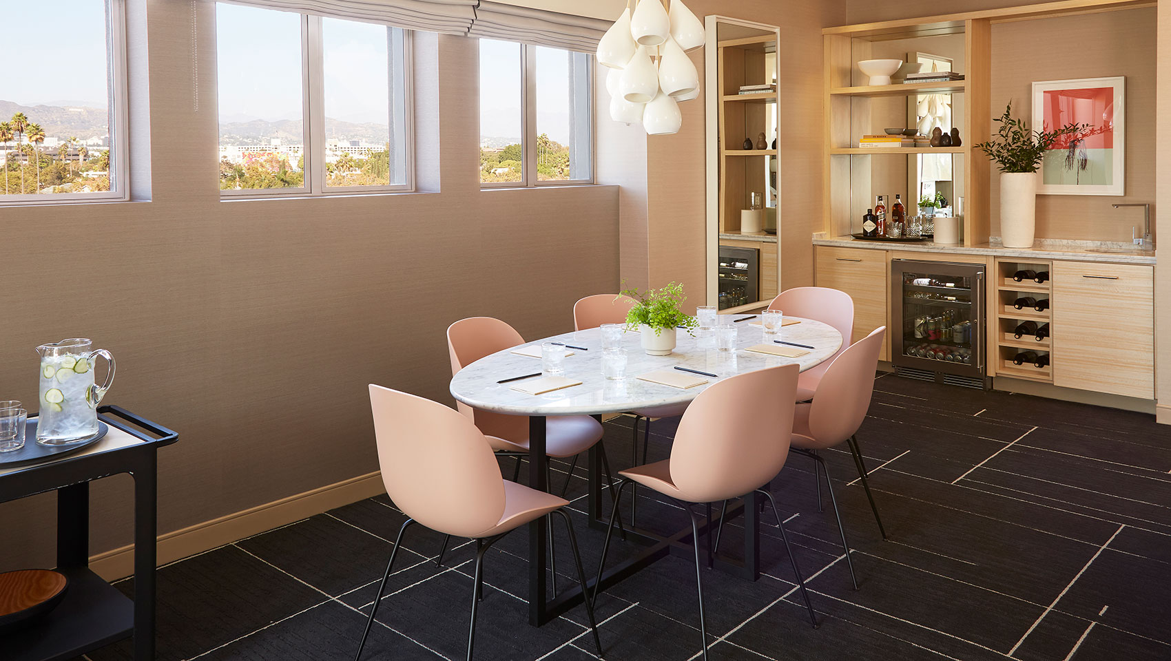 hollywood suite with conference table and seating