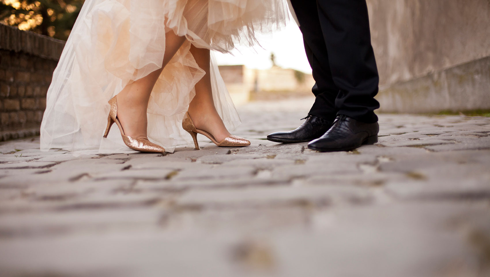 close up of bride and grooms shoes
