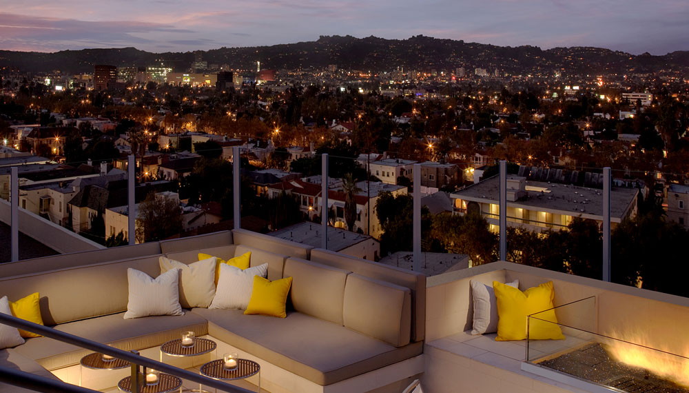 nighttime view of LA from rooftop lounge at Kimpton Hotel Wilshire