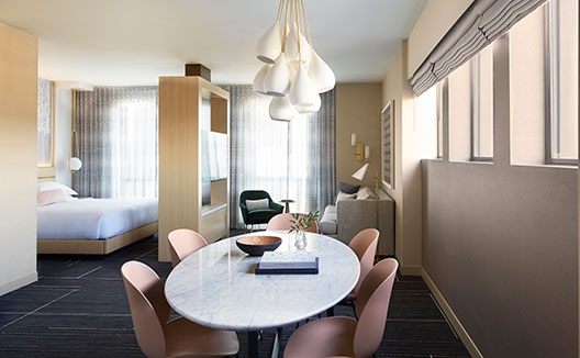 Suite Dining area and king bed